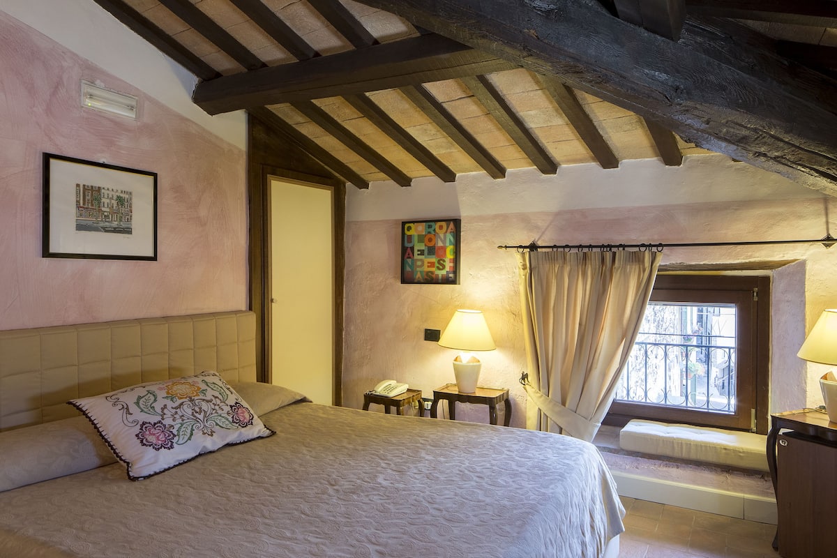Junior Suite | 1 bedroom, down comforters, in-room safe, individually decorated