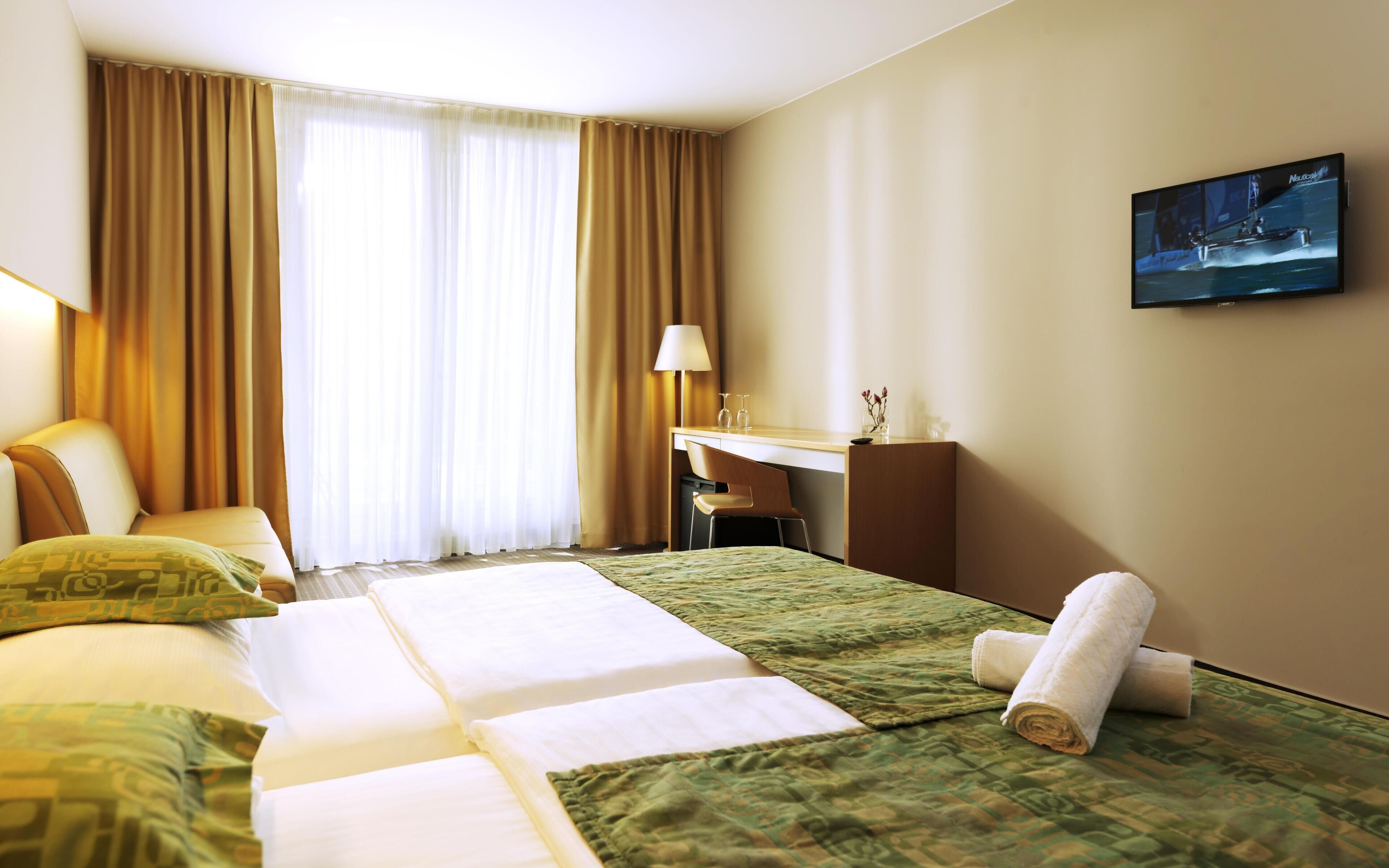 comfort double room | minibar, in-room safe, desk, blackout curtains