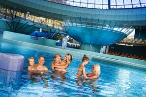 Indoor pool, outdoor pool, open 9 AM to 9 PM, pool loungers