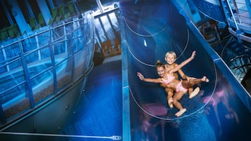 Indoor pool, outdoor pool, open 9 AM to 9 PM, pool loungers