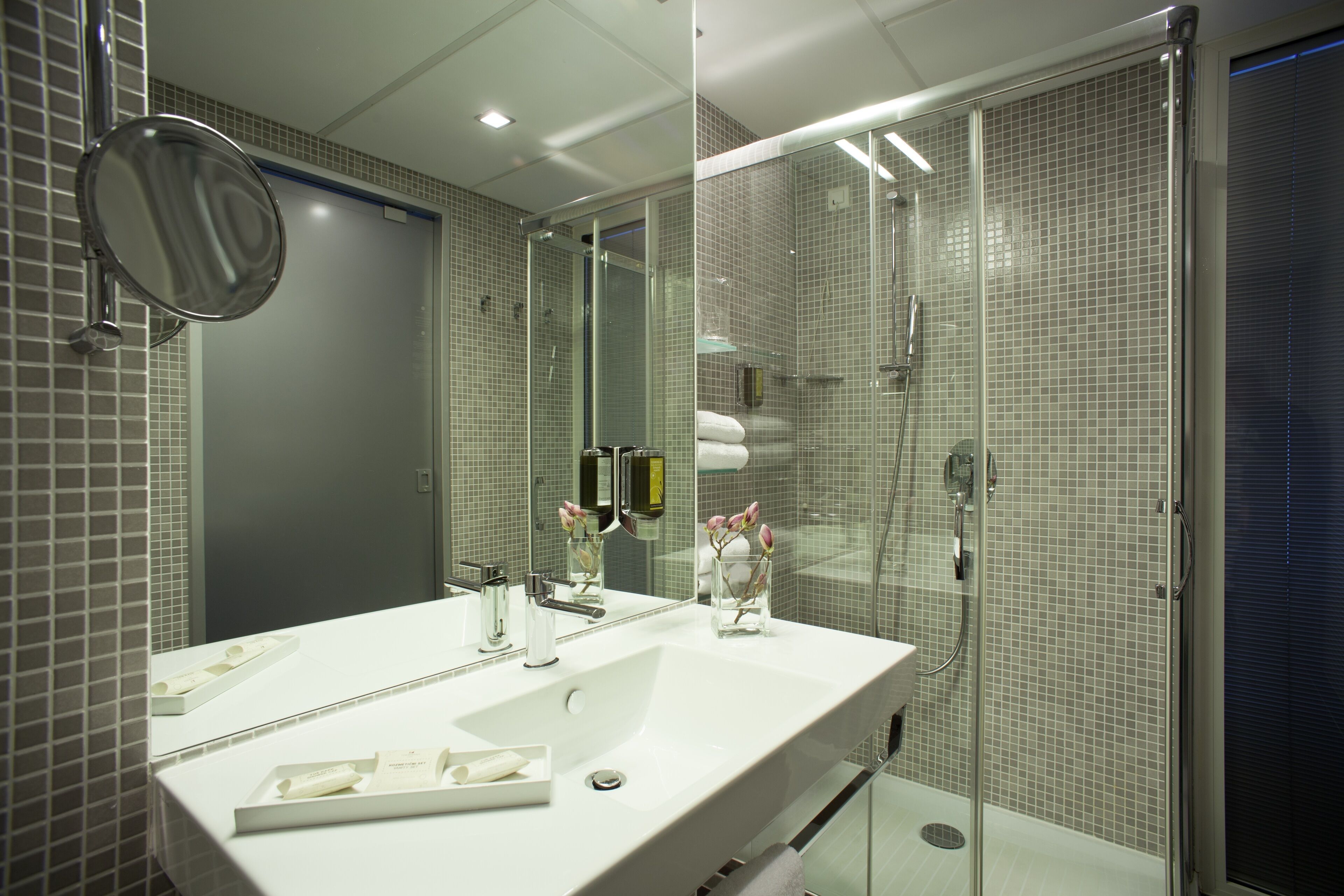 comfort single room | bathroom | hair dryer, bathrobes, slippers, towels