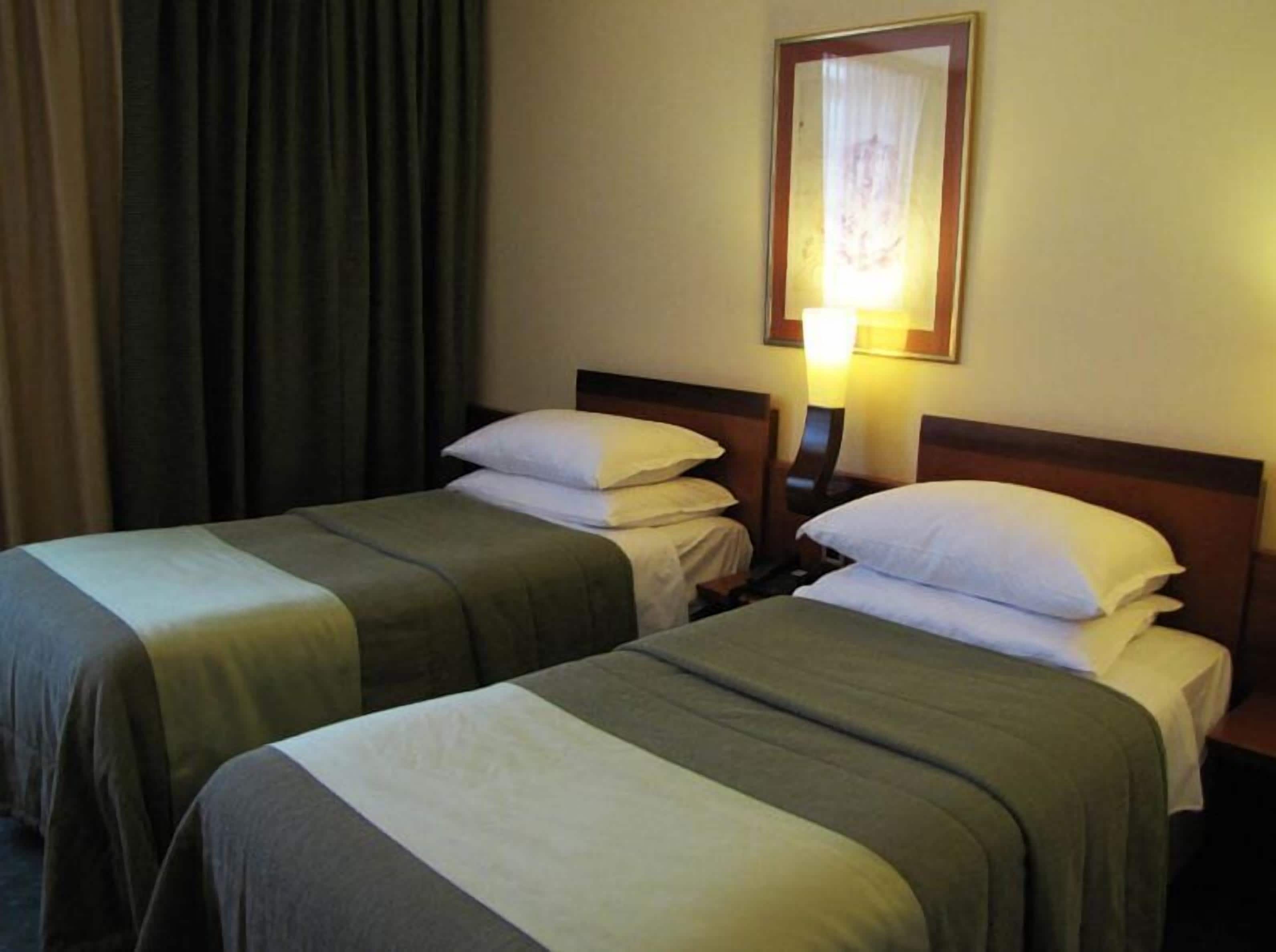 classic double or twin room, 1 double or 2 single beds | minibar, in-room safe, desk, blackout curtains