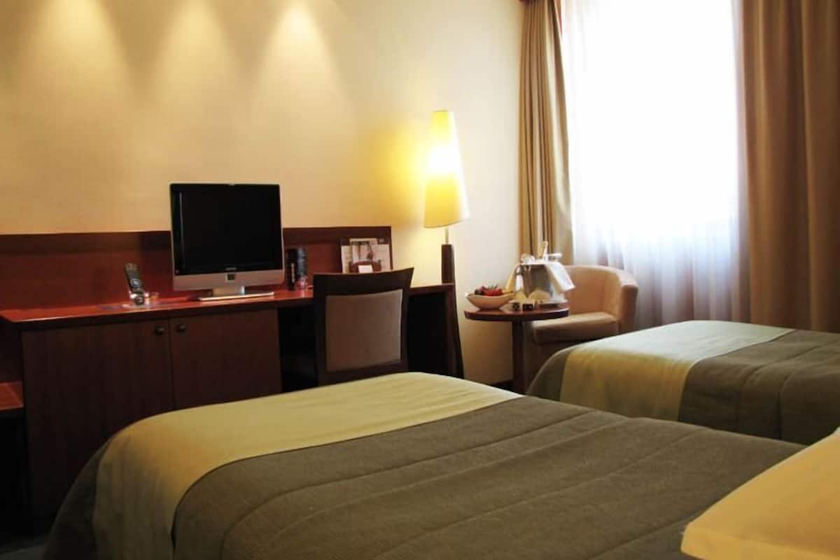 classic double or twin room, 1 double or 2 single beds | minibar, in-room safe, desk, blackout curtains