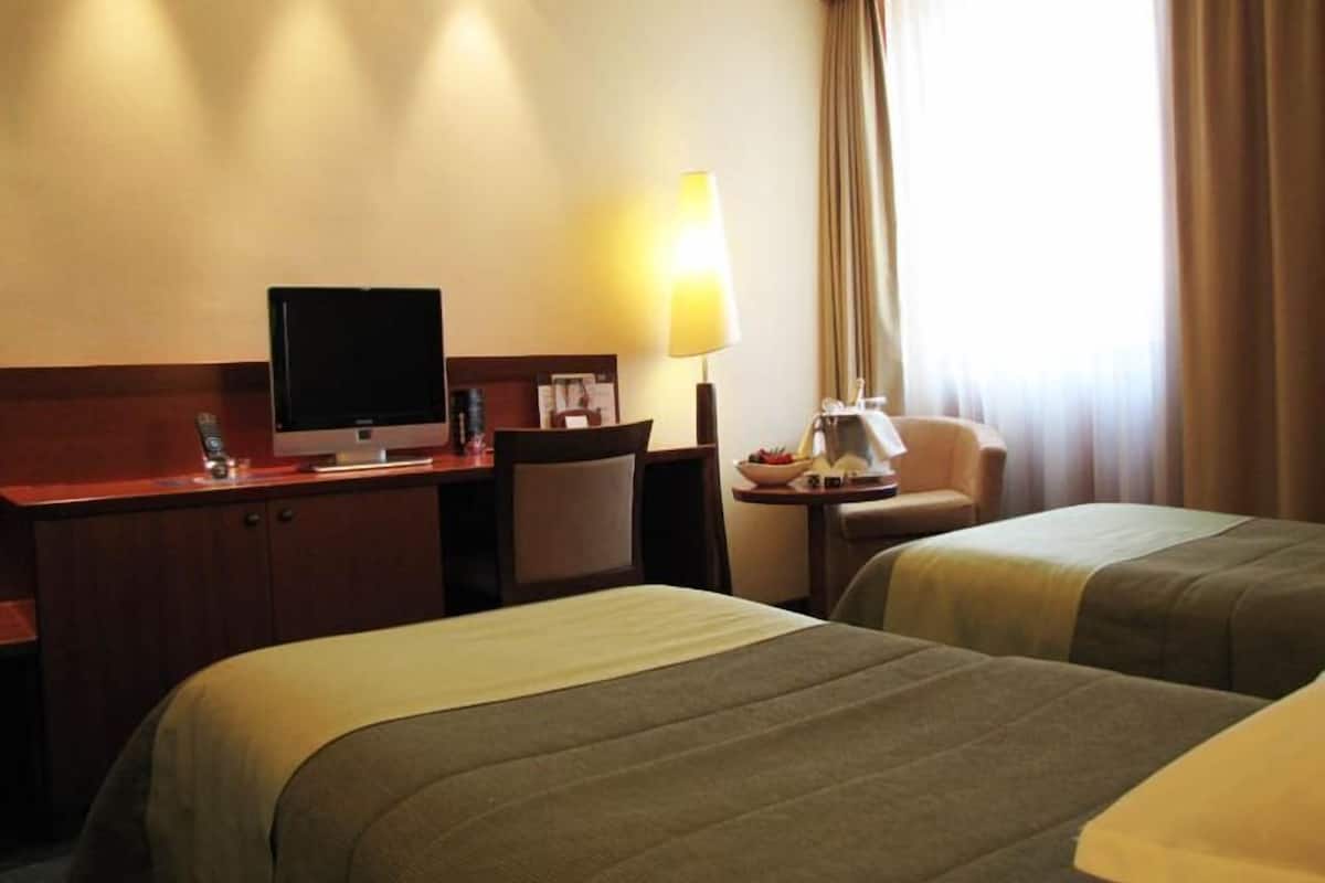 Classic Double or Twin Room, 1 Double or 2 Twin Beds | Minibar, in-room safe, desk, blackout drapes
