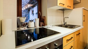 Departamento estándar, 2 habitaciones | Cocineta privada | Cafetera y tetera, refrigerador y parrilla de estufa 