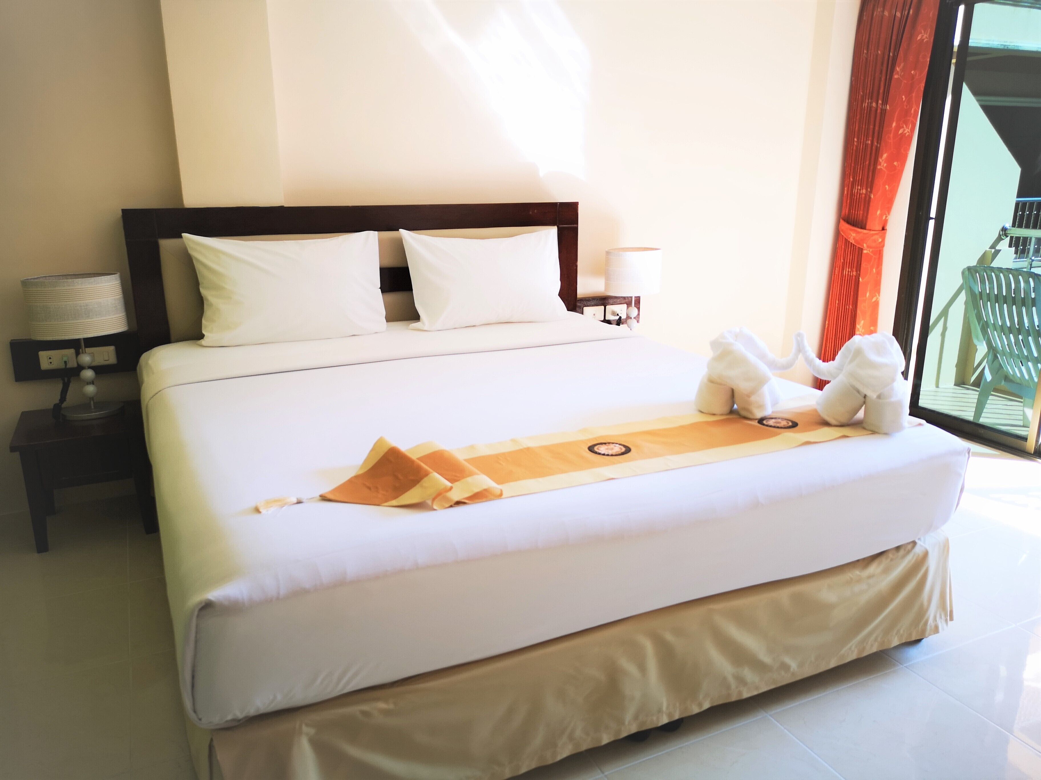 standard double room, 1 king bed, balcony, pool view | 1 bedroom, select comfort beds, in-room safe, desk