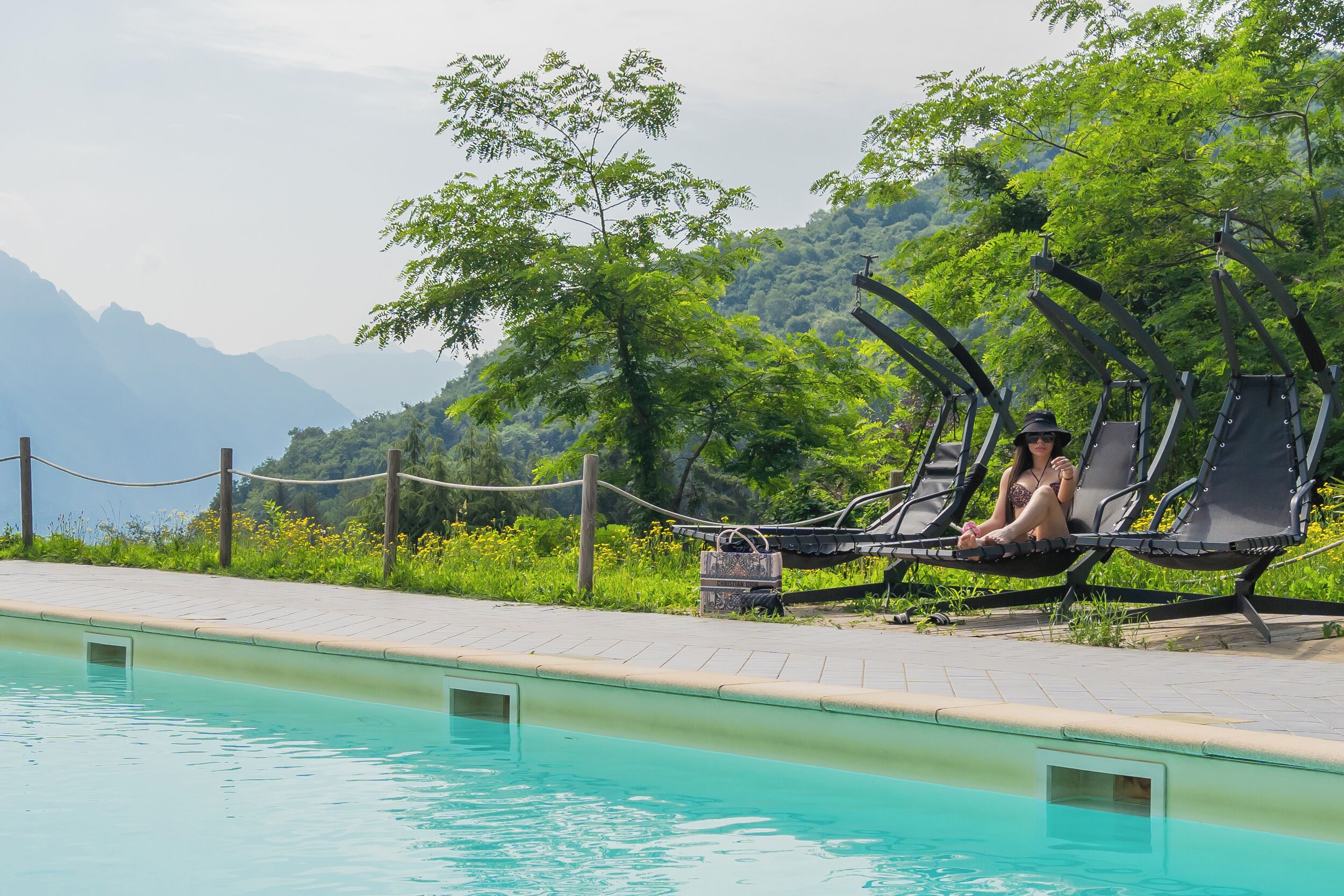 Seasonal outdoor pool, open 10:00 AM to 6:00 PM, sun loungers