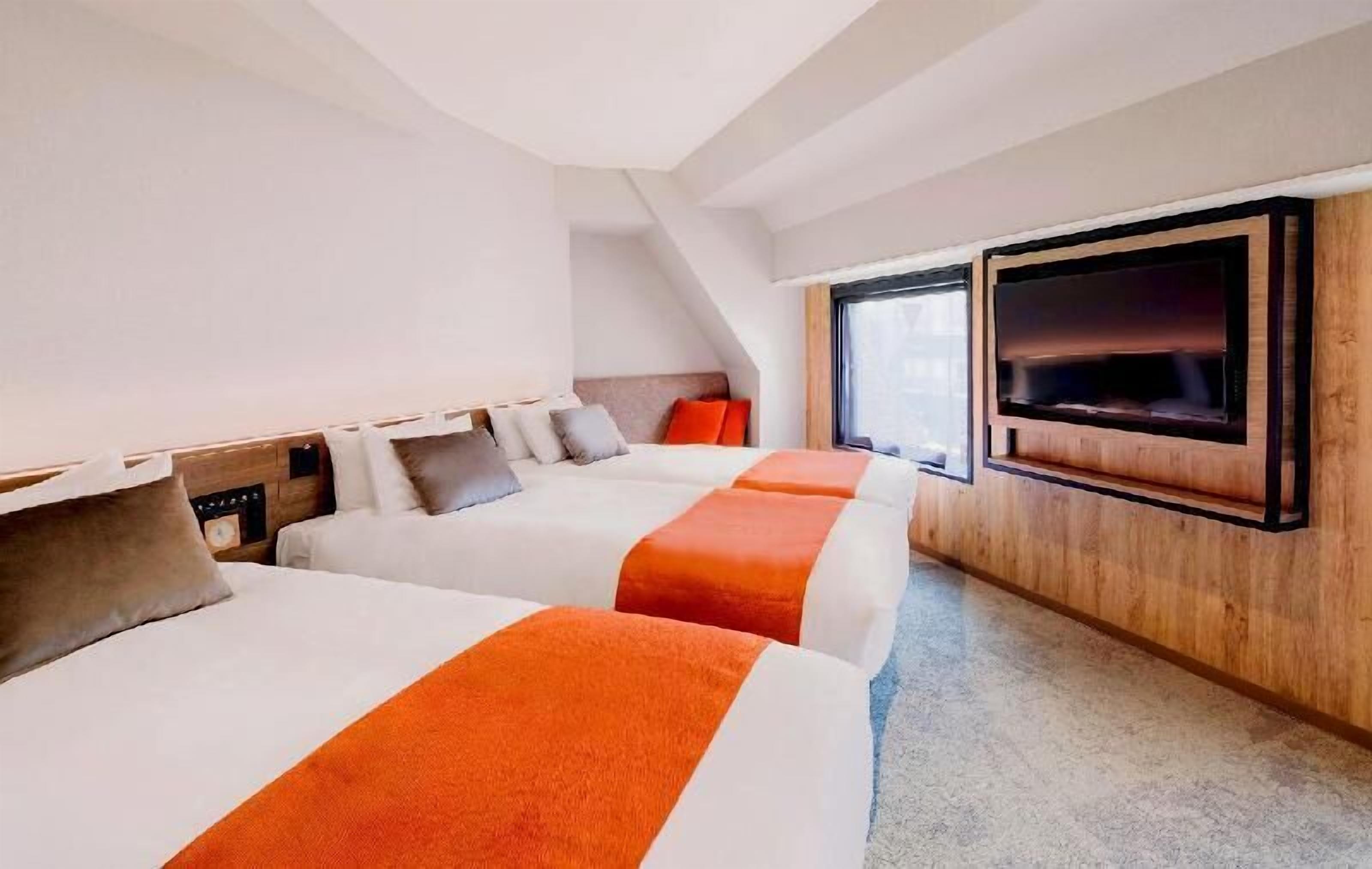 Down comforters, desk, blackout drapes, iron/ironing board