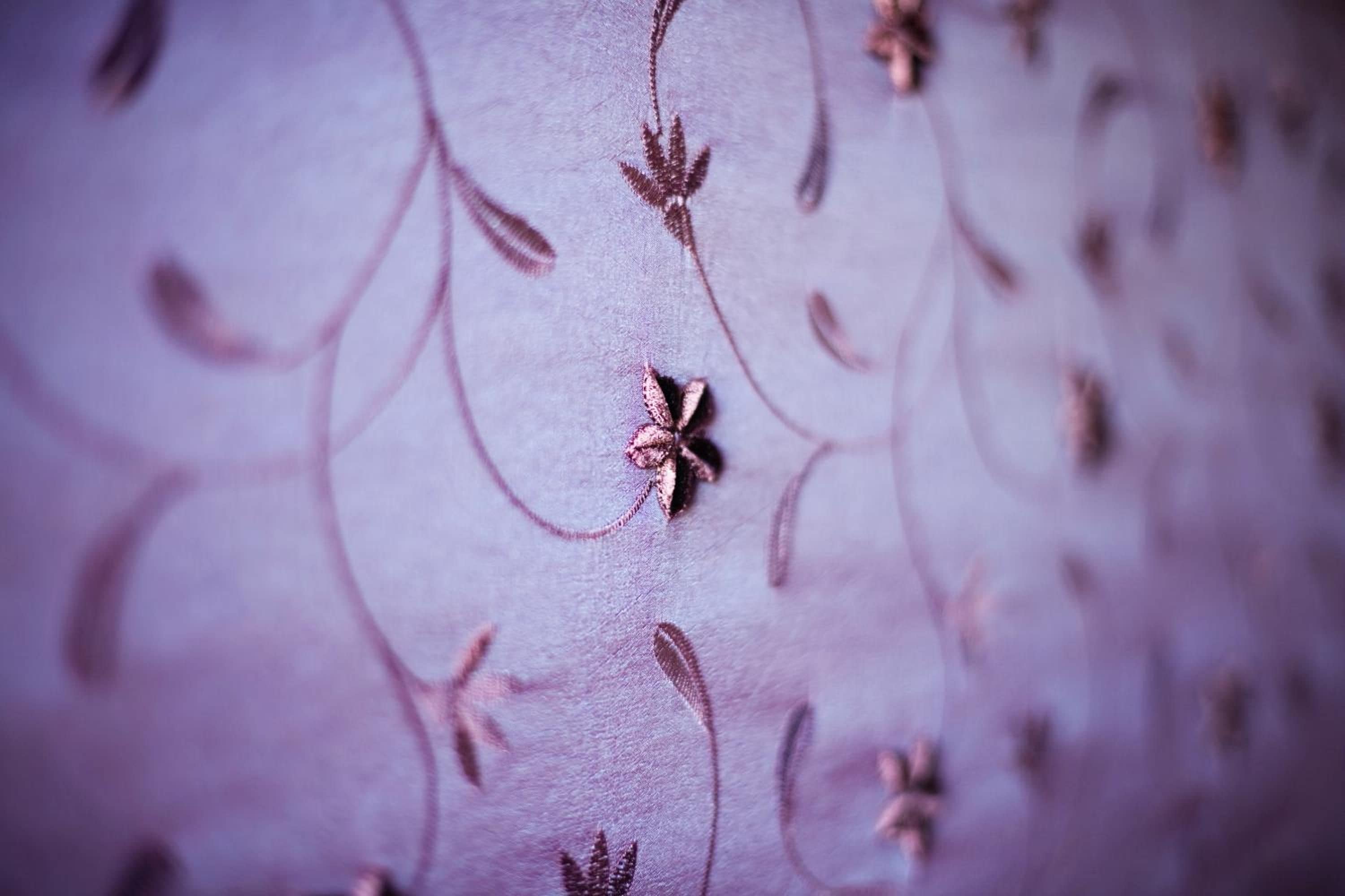 A close-up of a fabric with a floral pattern.
