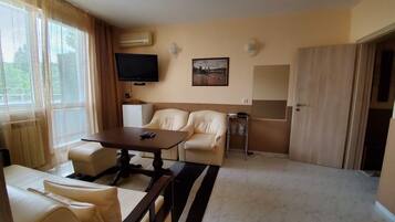 Standard Apartment, 1 Bedroom | Minibar, in-room safe, desk, iron/ironing board