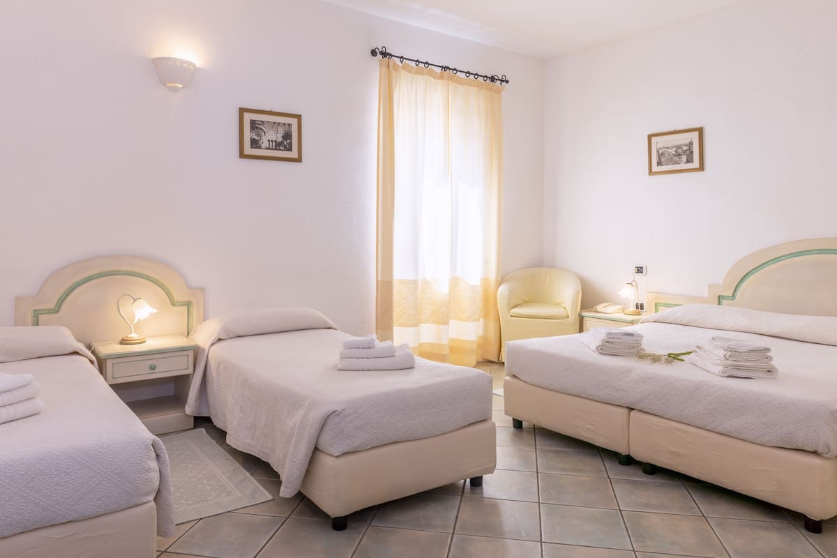 quadruple room | minibar, desk, blackout curtains, free wifi