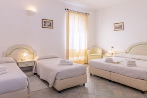 Quadruple Room | Minibar, desk, blackout drapes, free WiFi