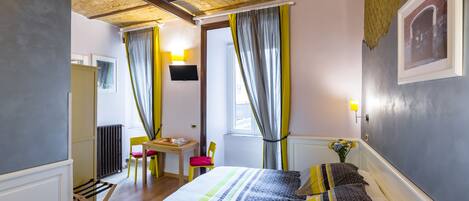 Triple Room | 1 bedroom, down duvets, in-room safe, desk