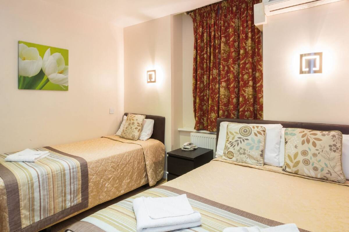Triple Room | Desk, soundproofing, iron/ironing board (on request), cribs (free)