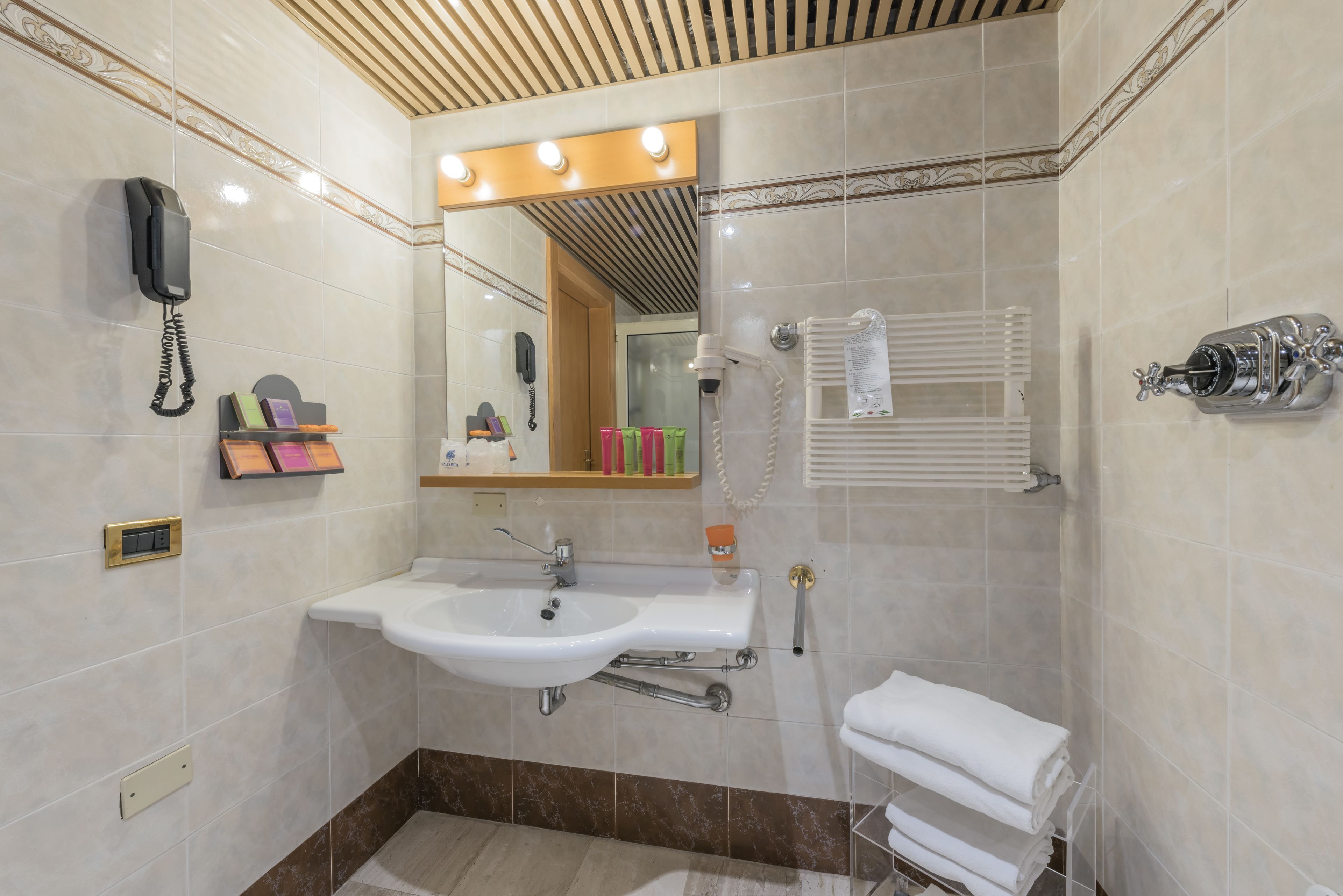 free toiletries, hair dryer, slippers, bidet