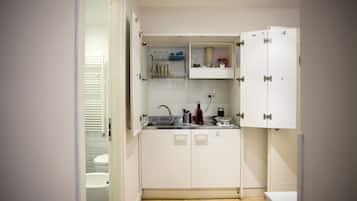 Superior driepersoonskamer | Privékeuken | Een koelkast, een espressoapparaat, een koffiezetapparaat/waterkoker