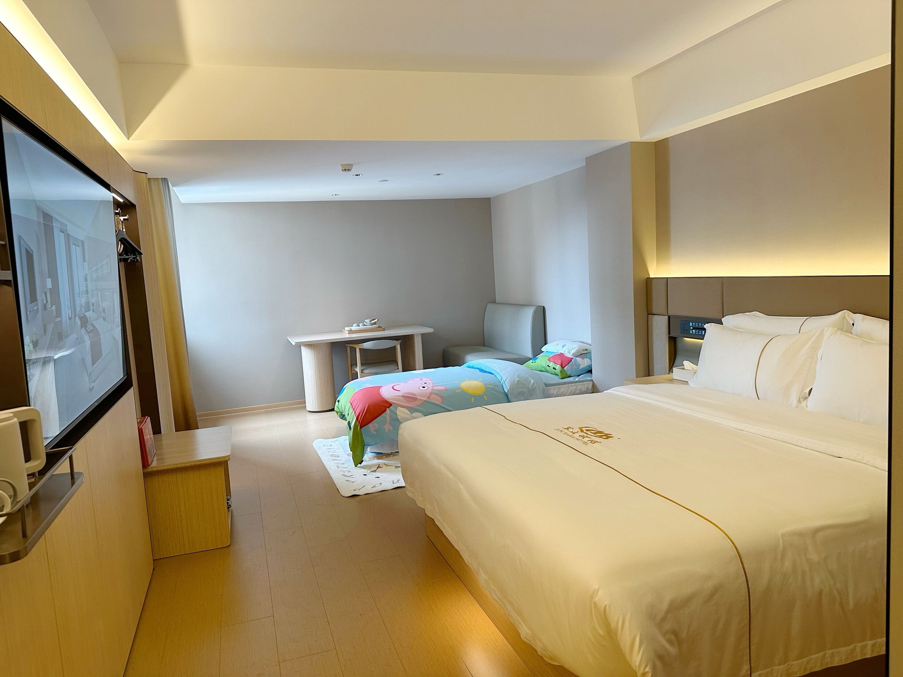 Family Twin Room | Down duvets, in-room safe, individually decorated, desk