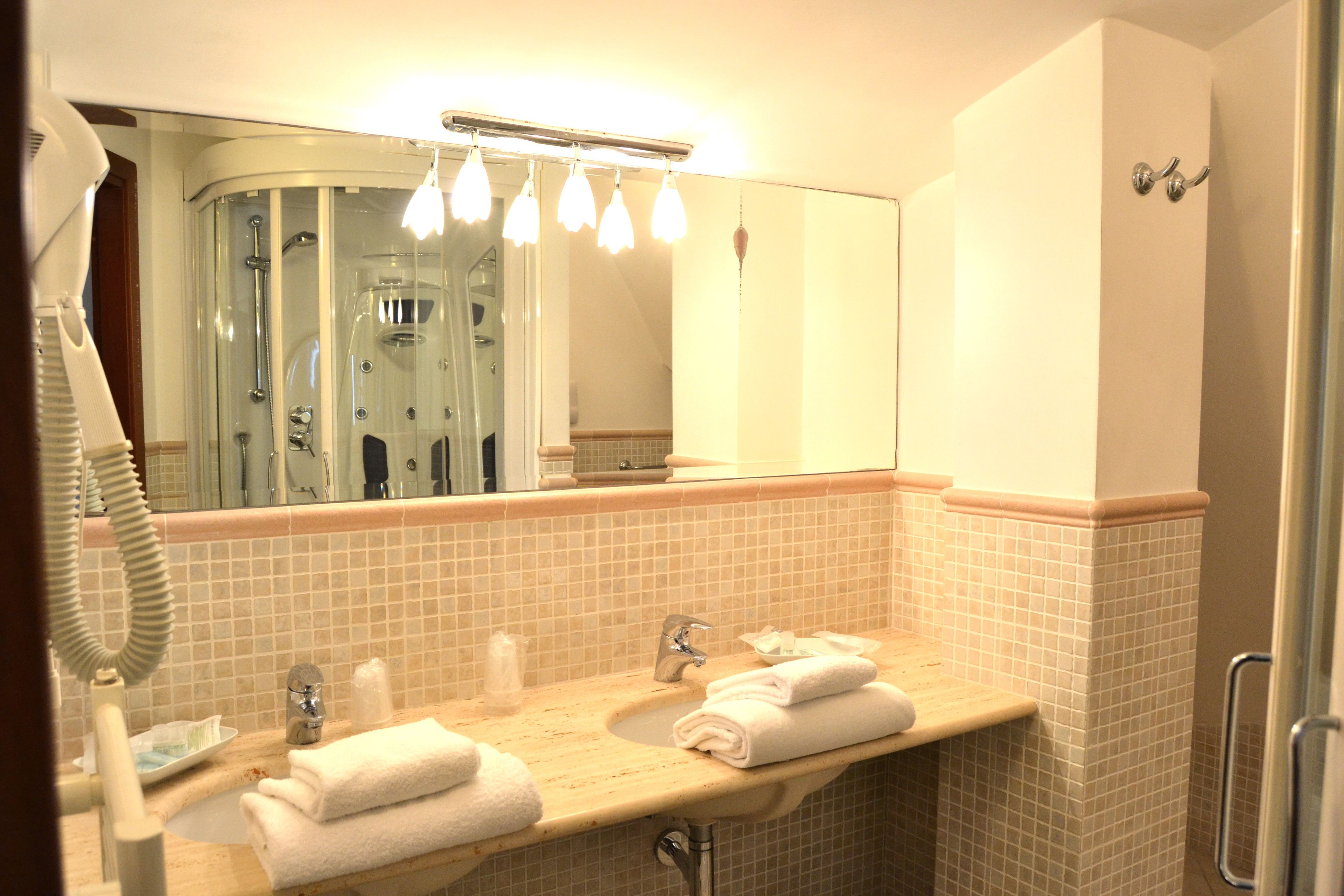 free toiletries, hair dryer, bidet, towels