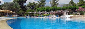 Indoor pool, outdoor pool, pool umbrellas, sun loungers