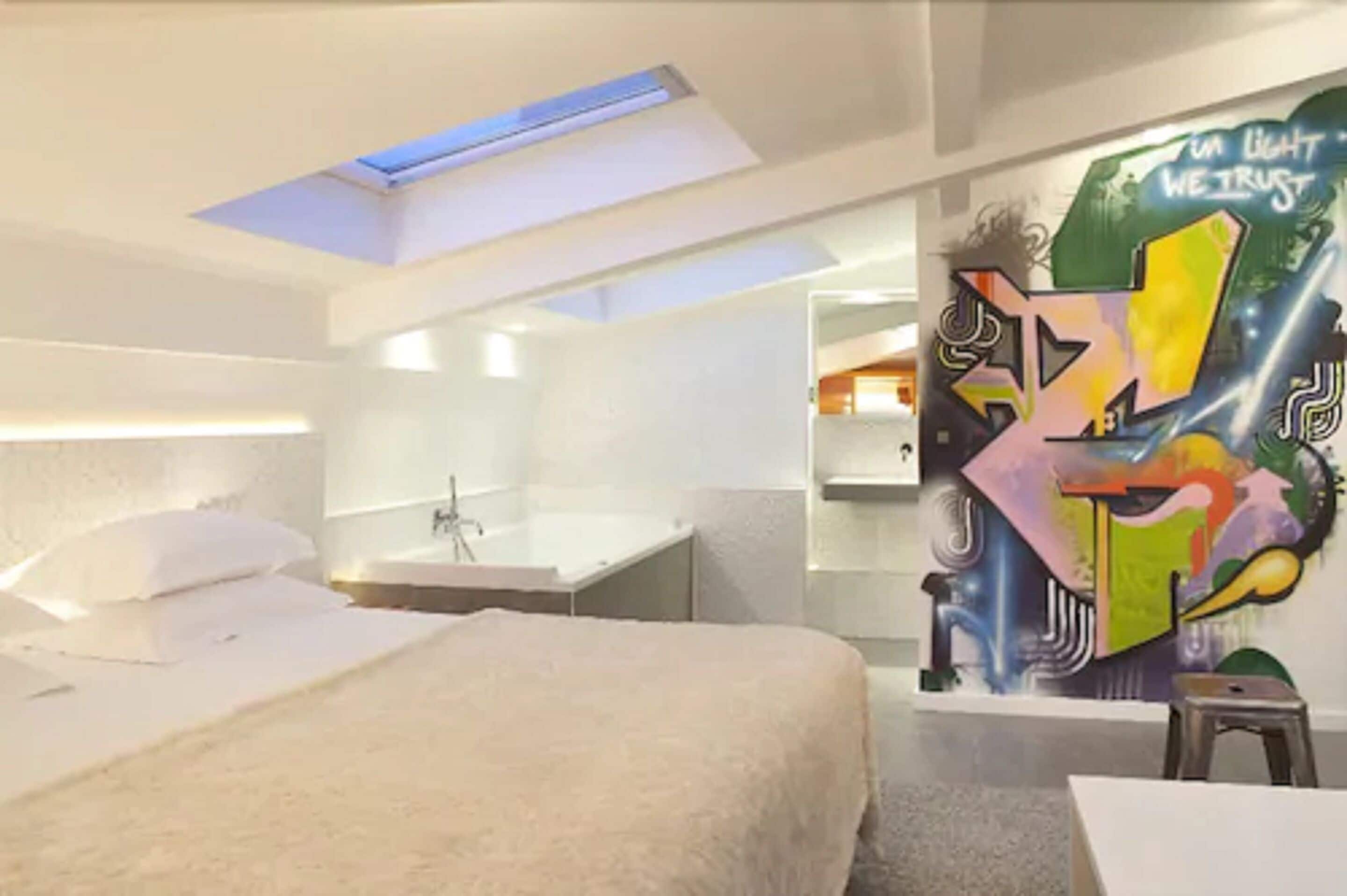 deluxe room | minibar, in-room safe, individually decorated, individually furnished