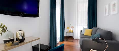 Habitació quàdruple familiar | Roba de llit d'alta qualitat, minibar i caixa forta a l'habitació