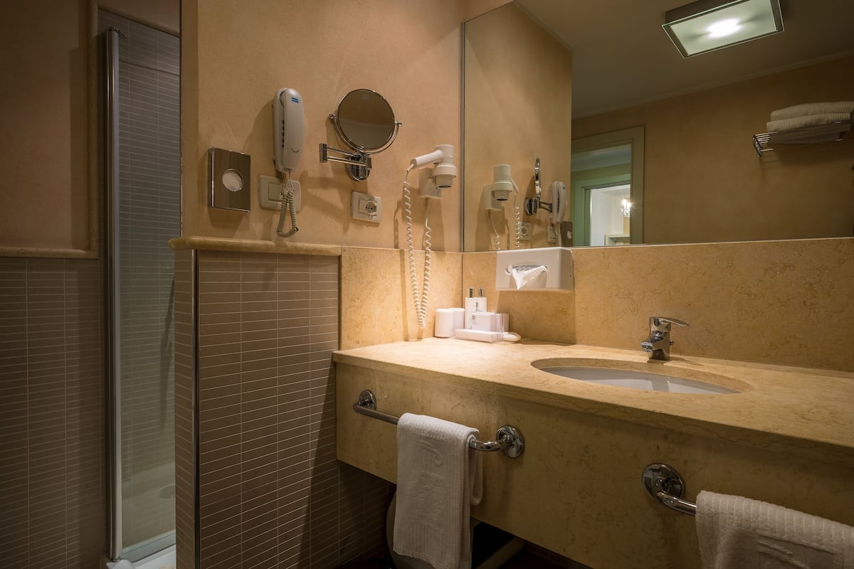 hair dryer, slippers, towels