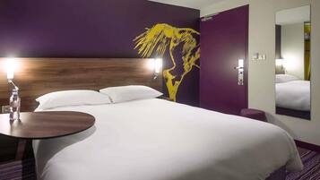 Premium bedding, in-room safe, desk, soundproofing
