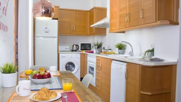 Apartment, 1 Bedroom | Private kitchen | Fridge, microwave, dishwasher, coffee/tea maker