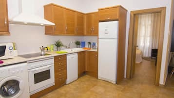 Apartment, 1 Bedroom | Private kitchen | Fridge, microwave, dishwasher, coffee/tea maker