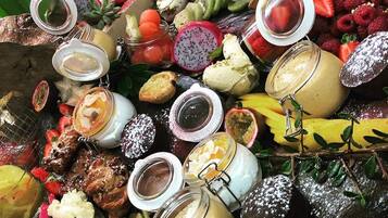 A variety of food items and condiments arranged on a table.