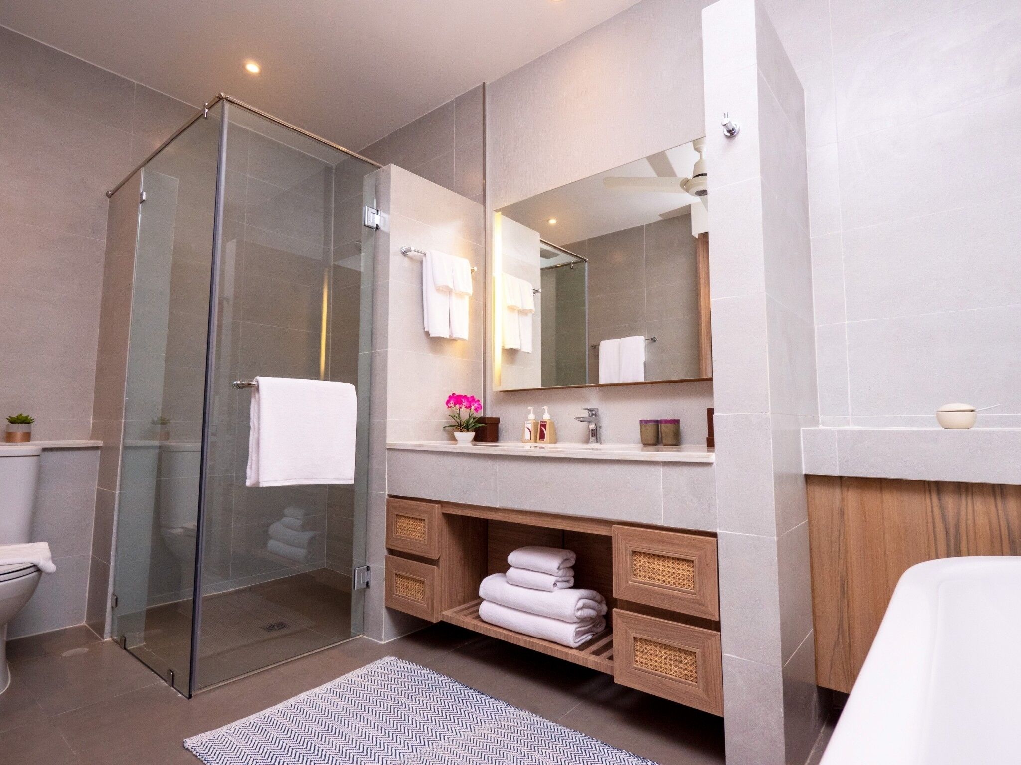 sanctuary deluxe | bathroom | shower, hair dryer, bathrobes, slippers
