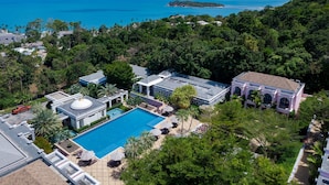 A resort with a swimming pool, multiple buildings, and a view of the ocean. - Absolute Sanctuary (Koh Samui)