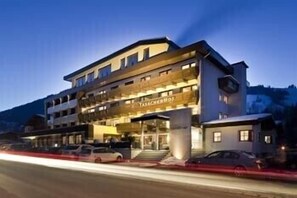 Front of property - evening/night - Hotel Taxacher (Kirchberg in Tirol)