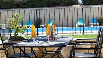Breakfast, lunch served; French cuisine, pool views