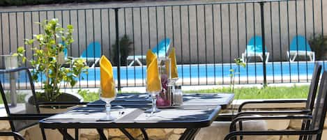 Breakfast, lunch served; French cuisine, pool views