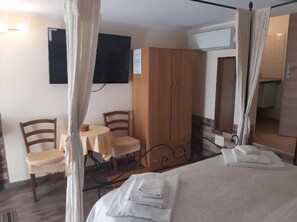 Habitació quàdruple | 1 dormitori, llençols de cotó egipci, minibar i escriptori