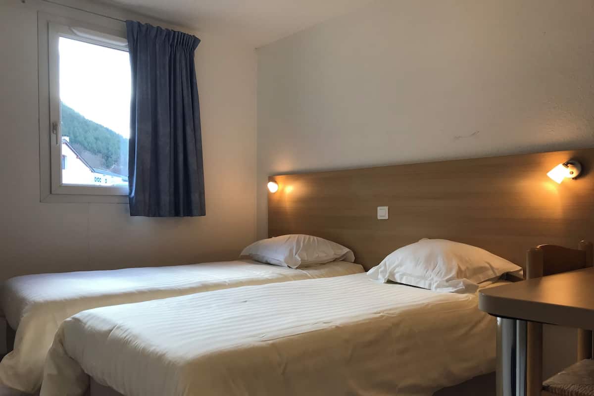 Twin Room | Memory foam beds, desk, soundproofing, iron/ironing board (on request)
