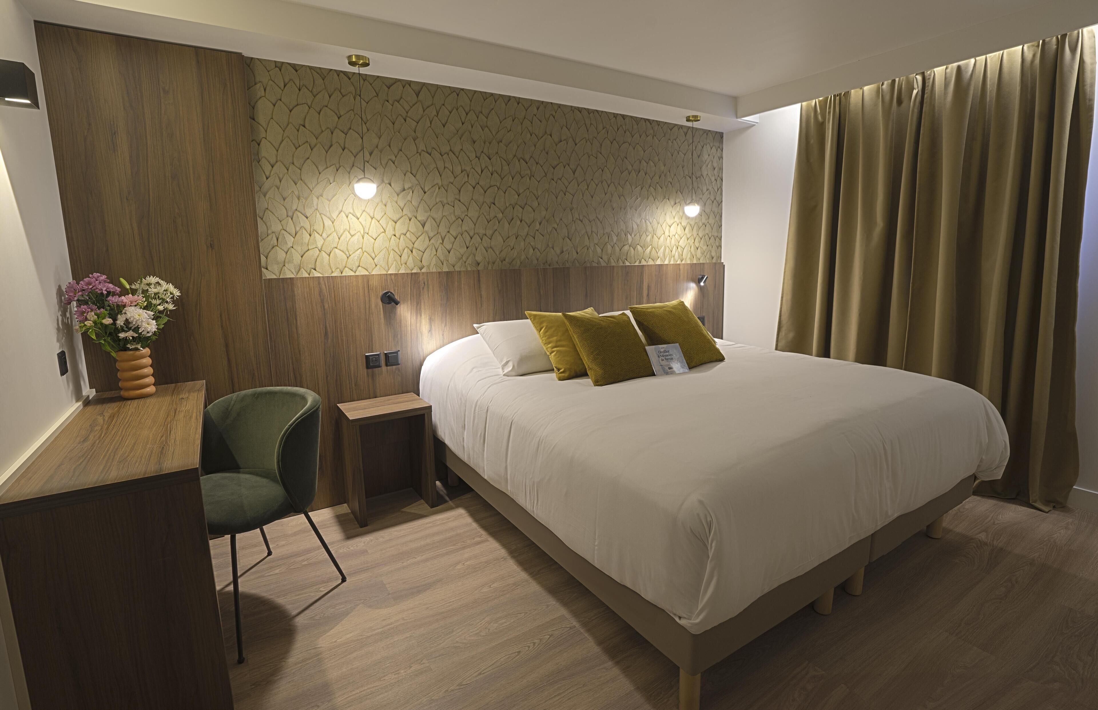 Premium bedding, desk, laptop workspace, blackout curtains