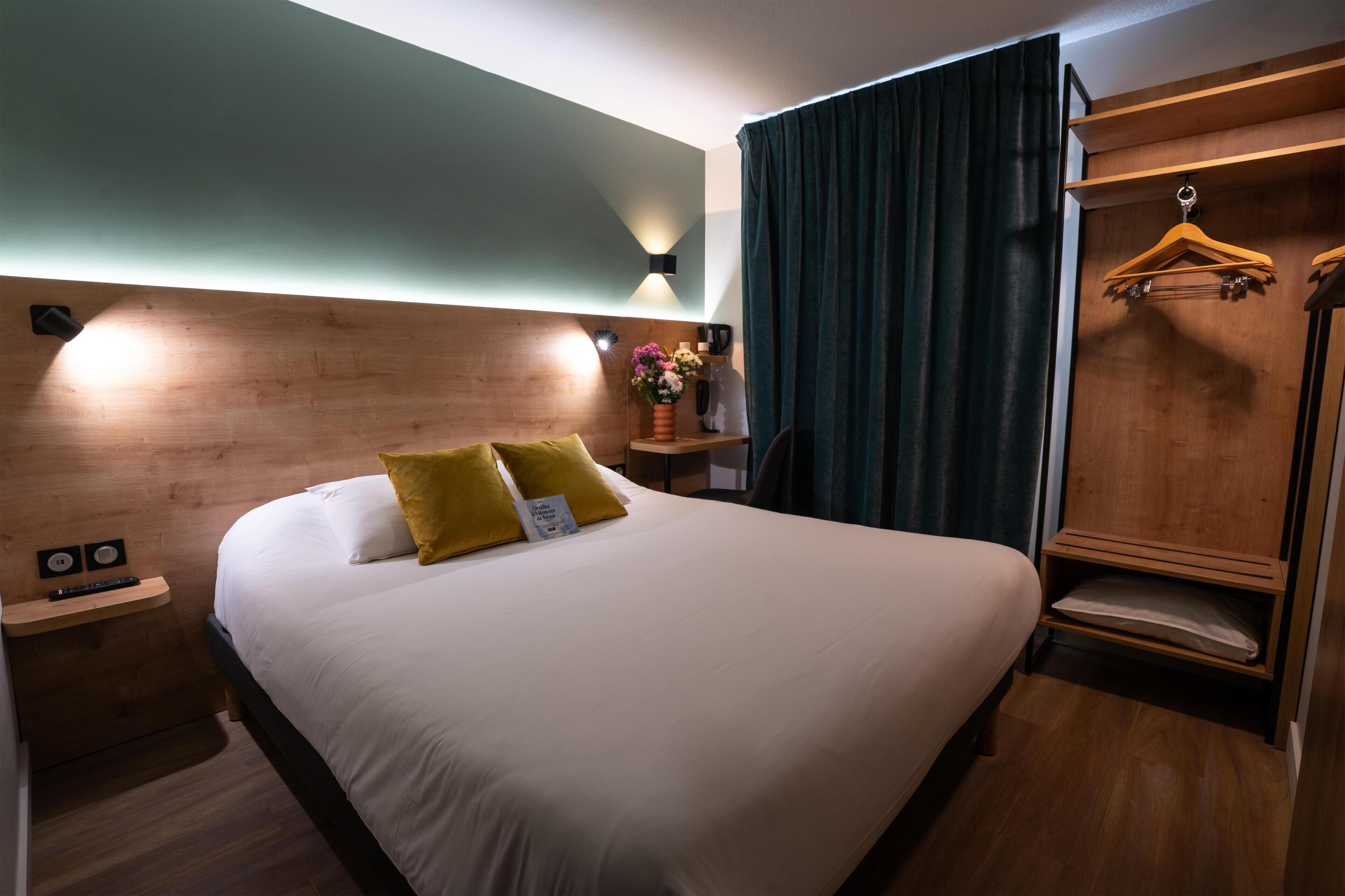 Premium bedding, desk, laptop workspace, blackout curtains