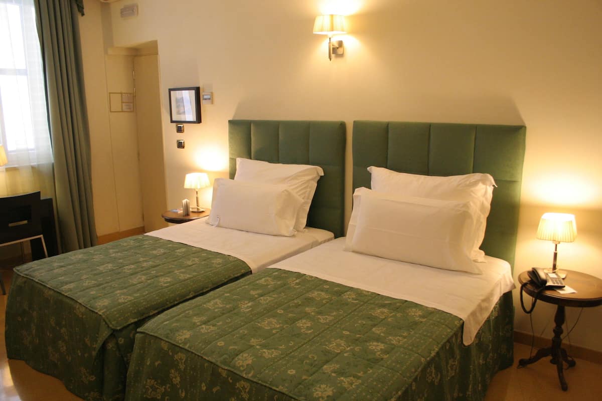 Standard Room, 2 Twin Beds | Minibar, in-room safe, desk, blackout drapes