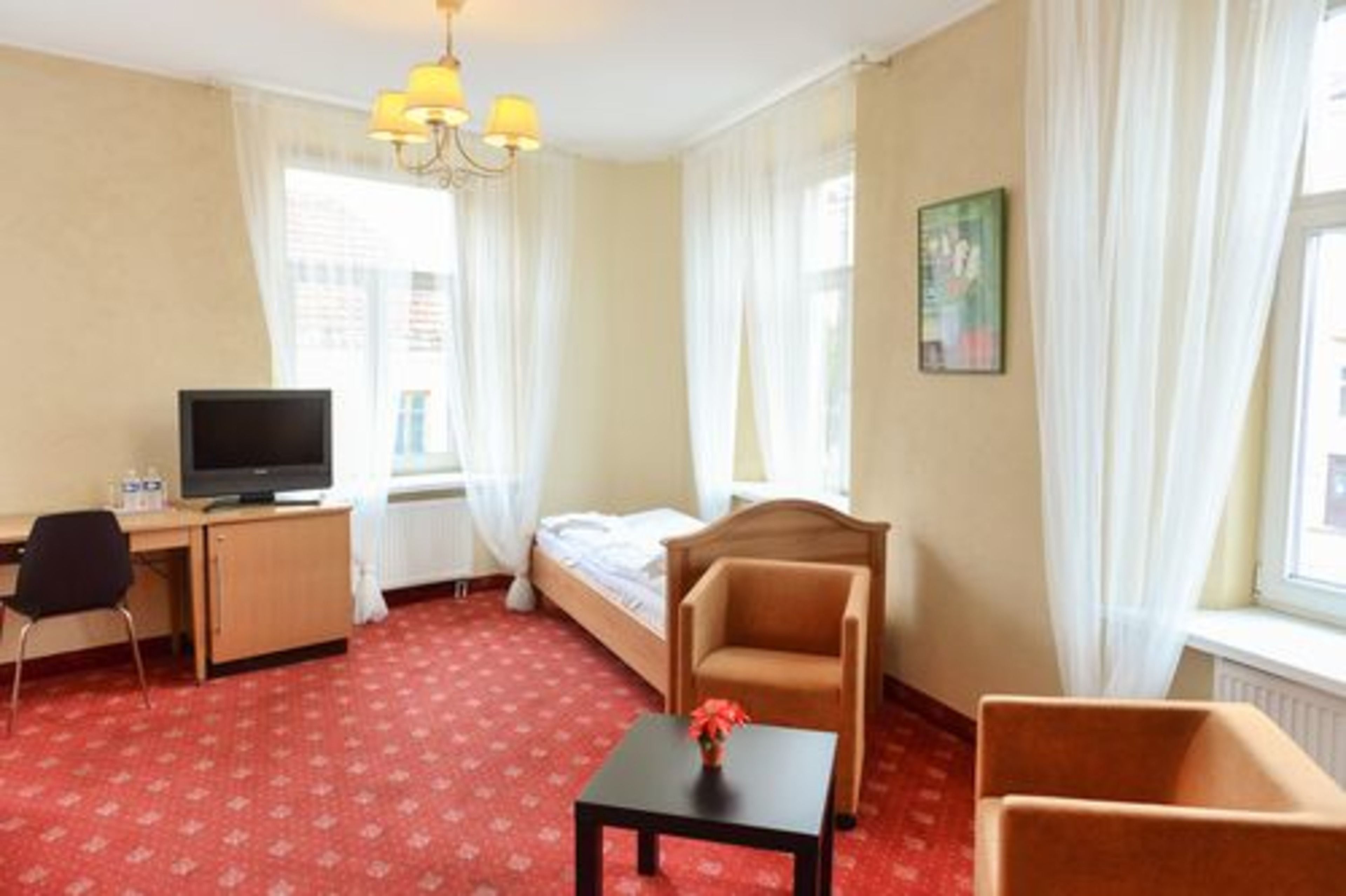 standard triple room | in-room safe, desk, soundproofing, iron/ironing board