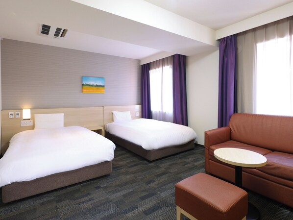 ألحفة محشوة بالريش وخزنة داخل الغرفة ومكتب وواي فاي مجانًا