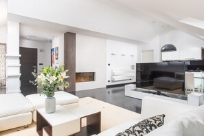 Penthouse Suite with Hot Tub Terrace and Old town view | Living area | LCD TV