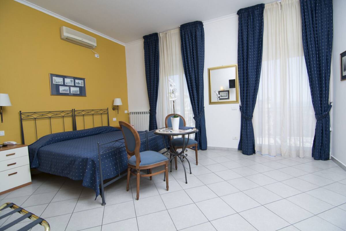 Standard Room, Sea View | 1 bedroom, minibar, in-room safe, desk