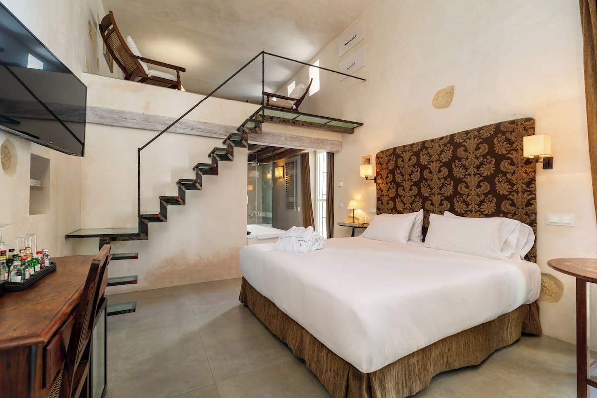 Deluxe studio suite | Een minibar, individueel gedecoreerd, individueel gemeubileerd