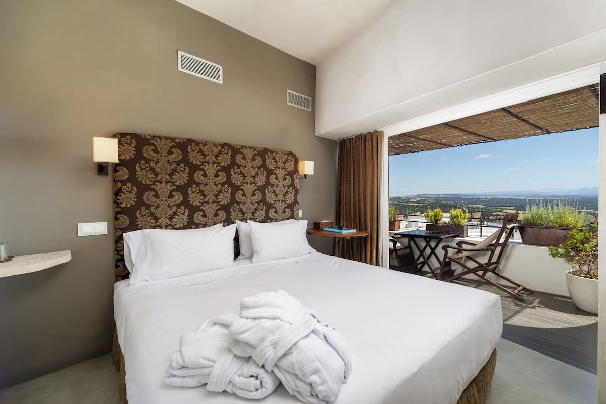 Luxe studio suite | Een minibar, individueel gedecoreerd, individueel gemeubileerd