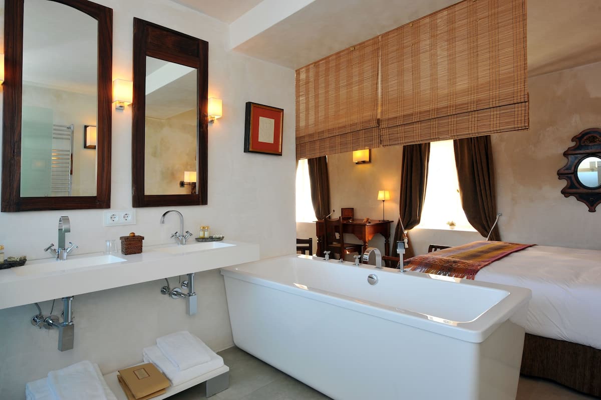 deluxe double room | bathroom | designer toiletries, hair dryer, bathrobes, slippers