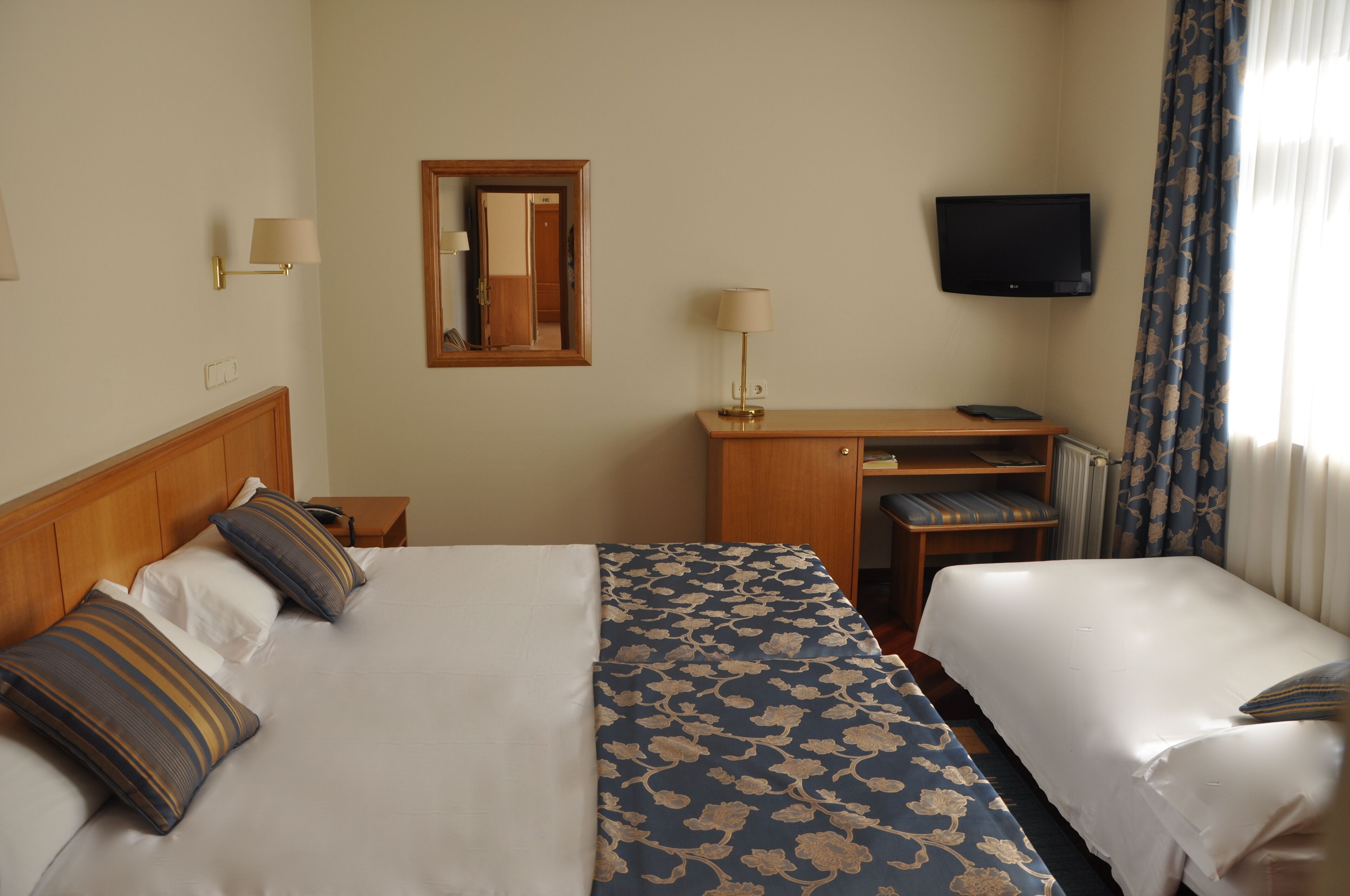 In-room safe, desk, laptop workspace, blackout curtains