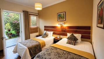 Comfort Twin Room, Garden View | Down comforters, desk, laptop workspace, free WiFi