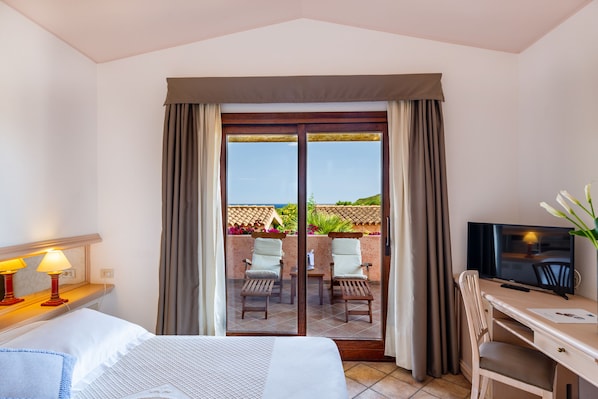 Double cottage room, sea view | Minibar, in-room safe, desk, free WiFi - Sant'Elmo Beach Hotel (Castiadas)